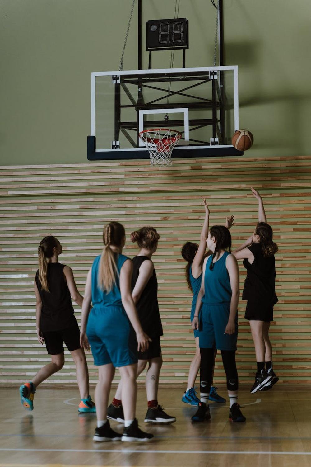 group_of_women_playing_basketball